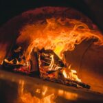 Entretien cheminée : conseils pratiques pour bois et charbon